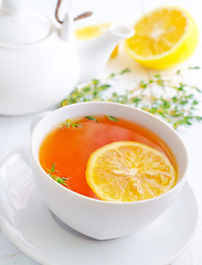 Image showing Fresh tea with lemon in the white cup