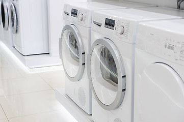 Image showing laudry dryers and washing mashines in appliance store