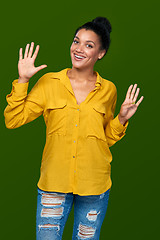 Image showing Woman showing nine fingers