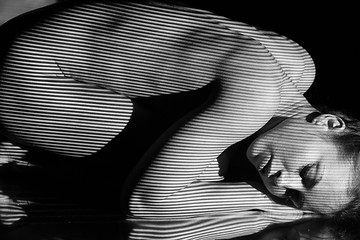 Image showing The  body of woman with black and white zebra stripes