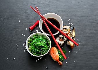 Image showing Seaweed salad and sushi