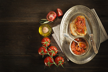 Image showing Appetizer with tomato sauce and bruscetta.