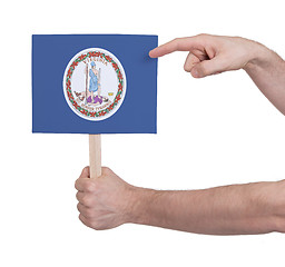 Image showing Hand holding small card - Flag of Virginia