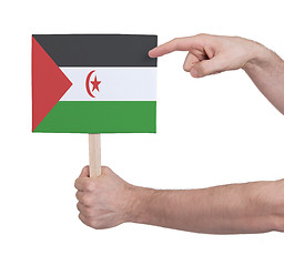 Image showing Hand holding small card - Flag of Western Sahara