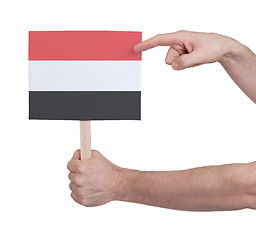 Image showing Hand holding small card - Flag of Yemen