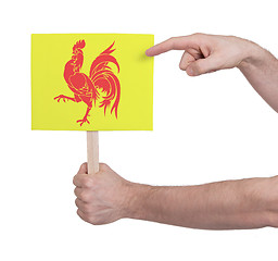 Image showing Hand holding small card - Flag of Wallonia