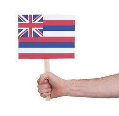 Image showing Hand holding small card - Flag of Hawaii