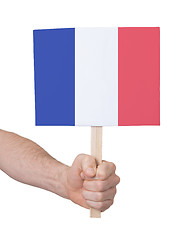 Image showing Hand holding small card - Flag of France