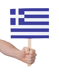 Image showing Hand holding small card - Flag of Greece