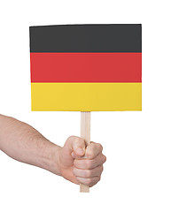 Image showing Hand holding small card - Flag of Germany