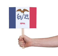 Image showing Hand holding small card - Flag of Iowa