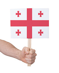 Image showing Hand holding small card - Flag of Georgia