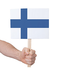 Image showing Hand holding small card - Flag of Finland