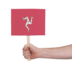 Image showing Hand holding small card - Flag of Isle of man