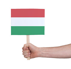 Image showing Hand holding small card - Flag of Hungary