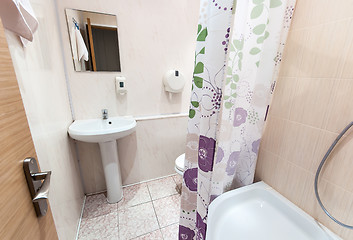 Image showing bathroom with sink toilet and shower tray