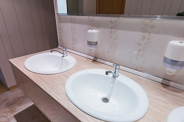 Image showing bathroom with sinks in hostel