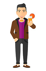 Image showing Man holding glass of juice.