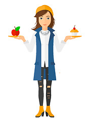 Image showing Woman with apple and cake.