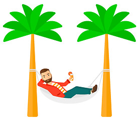 Image showing Man chilling in hammock.