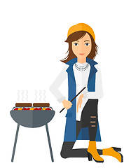 Image showing Woman preparing barbecue.