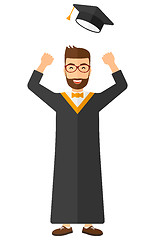 Image showing Graduate throwing up his hat.