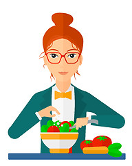 Image showing Woman cooking meal.