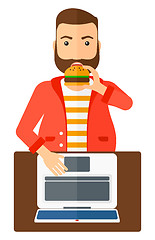 Image showing Man eating hamburger. 