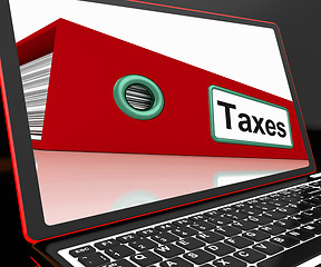 Image showing Taxes File On Laptop Shows Online Payment