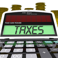 Image showing Taxes Calculator Means Taxation Of Income And Earnings