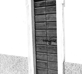 Image showing detail in  wall door  italy land europe architecture and wood th