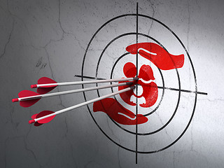 Image showing Insurance concept: arrows in Family And Palm target on wall background