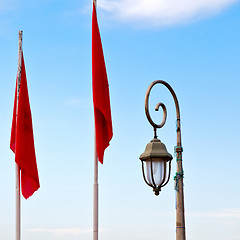 Image showing tunisia  waving flag in the blue sky  colour and street lamp 