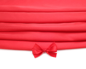 Image showing red silk fabric with bow