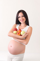 Image showing pregnant woman with fruits