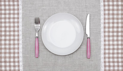 Image showing empty plate with fork and knife