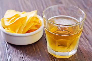 Image showing chips from potato with beer