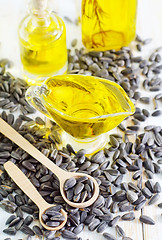 Image showing sunflower seeds and oil