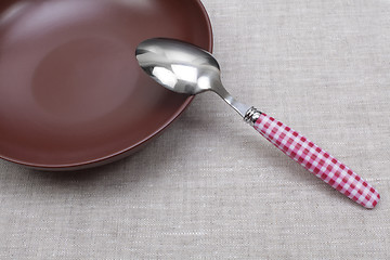 Image showing empty plate with spoon 