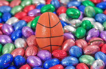 Image showing basketball egg amongst other easter eggs