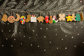 Image showing Cardboard toys for the Christmas tree or garland. Creative decorations. Selective Focus