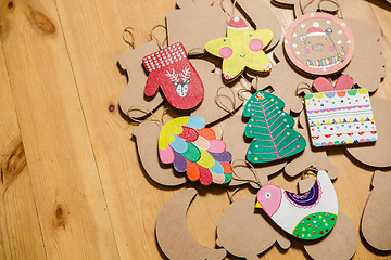 Image showing Cardboard toys for the Christmas tree or garland. New year decorations.