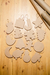 Image showing Cardboard toys for the Christmas tree or garland. New year decorations.