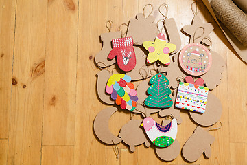 Image showing Cardboard toys for the Christmas tree or garland. New year decorations.