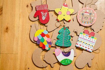 Image showing Cardboard toys for the Christmas tree or garland. New year decorations.