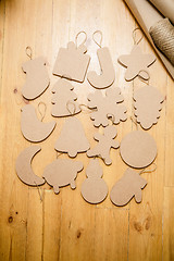 Image showing Cardboard toys for the Christmas tree or garland. New year decorations.