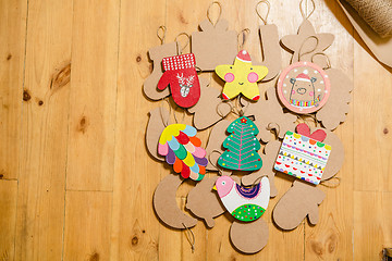 Image showing Cardboard toys for the Christmas tree or garland. New year decorations.