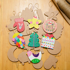 Image showing Cardboard toys for the Christmas tree or garland. New year decorations.