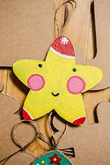 Image showing Cardboard toys for the Christmas tree or garland. New year decorations.