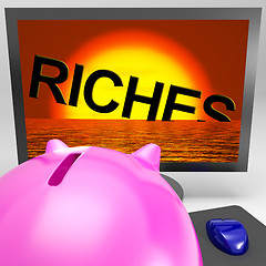 Image showing Riches Sinking On Monitor Shows Bankruptcy